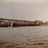 <p>From 1893 until 1932, a wood trestle for unloading coal barges dominated the Freight Pier, also called the Coal Dock. View to northeast, ca. 1893.</p>